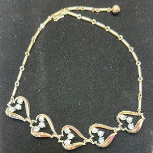 Vintage Silver metal String of Hearts w/blue Rhinestones Necklace- 16”